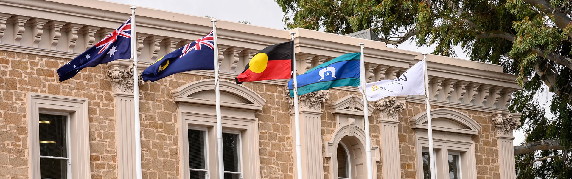 Flags flying in front of the Unley Town Hall