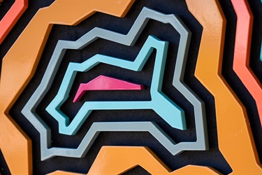 Close-up of red, orange, grey, blue and black layer details