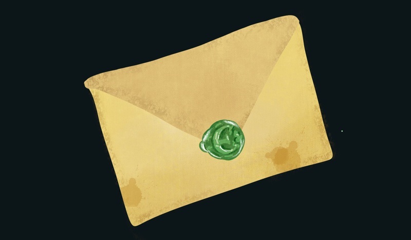 old fashioned envelope with green wax seal