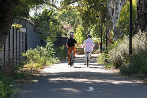 seniors cycling on bikepath