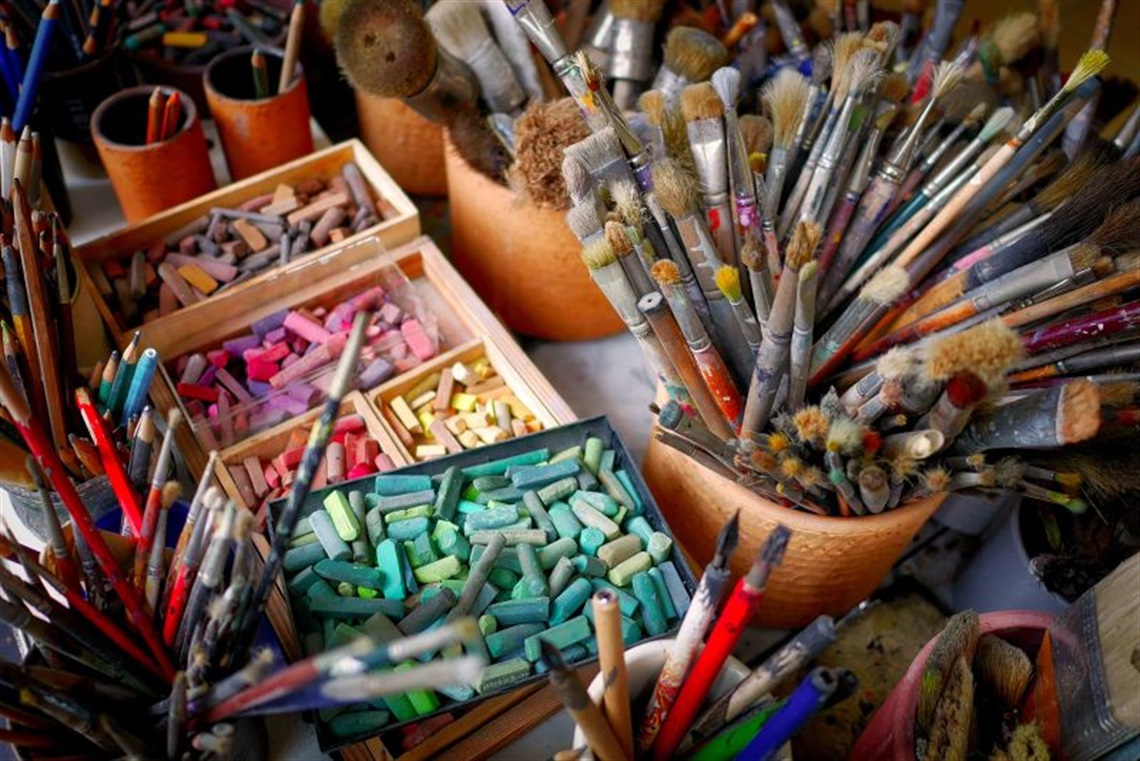 chalk pastels and brushes on table
