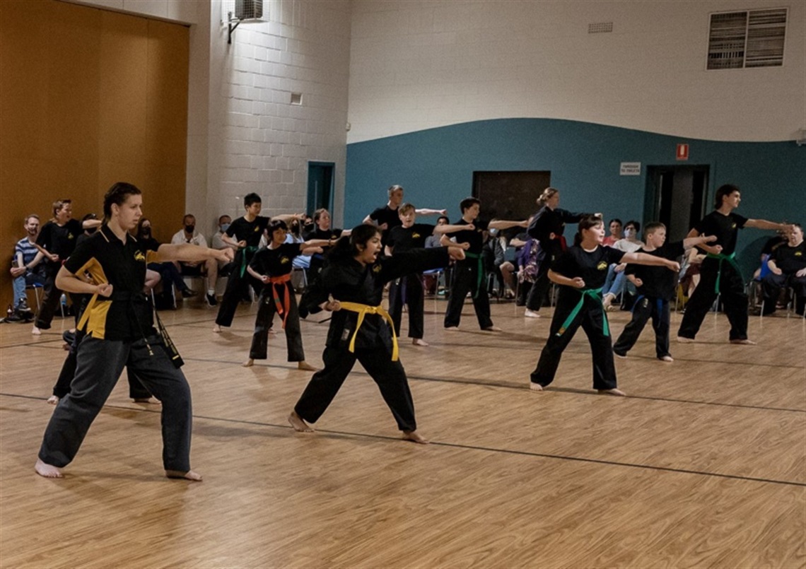 Oriental martial arts academy class in progress