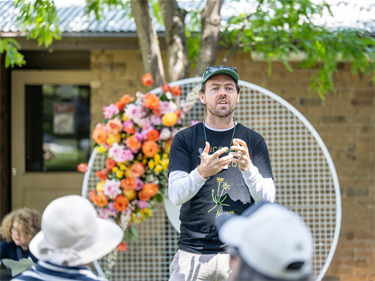 a man presenting at spring fling 
