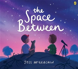 two boys sit on a small hill with a dog and a telescope, looking up at a purple-pink starry sky