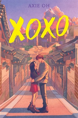 a young man and woman embrace in a street lined by old fashioned Korean houses