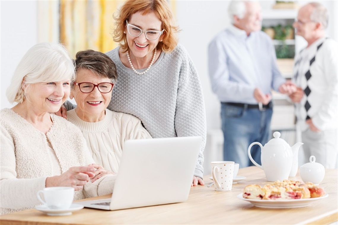 Seniors using laptop