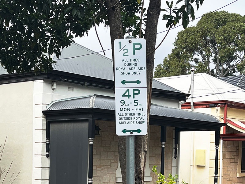 half-hour and four-hour show parking signs