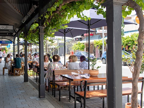 King William Road view along footpath and outdoor dining